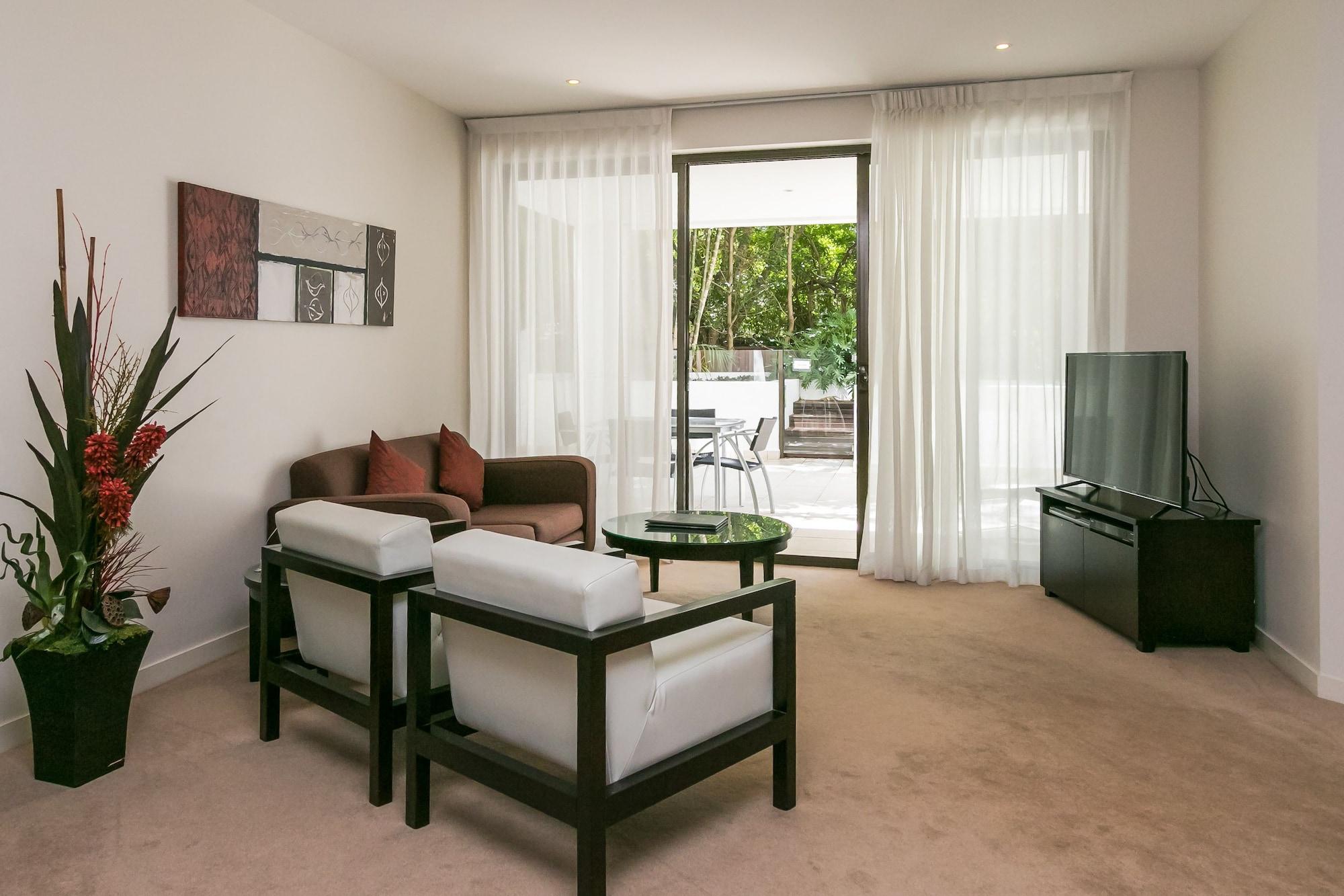 Grand Mercure Allegra Херви Бей Екстериор снимка A living room