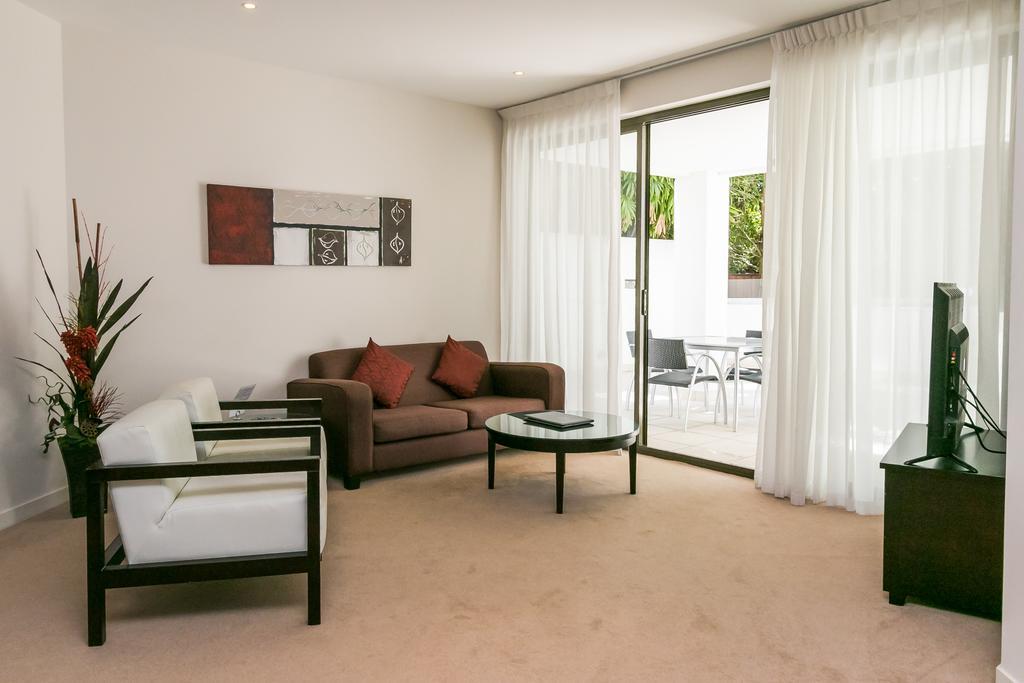 Grand Mercure Allegra Херви Бей Екстериор снимка A living room